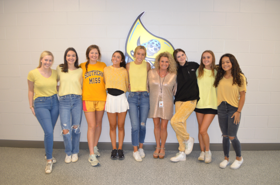 Go Gold... students in A. Hobarts online news and yearbook class show their support for childhood cancer awareness. 