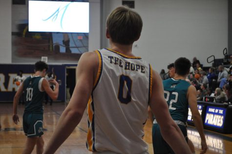 Walk the plank... Junior Mcrae Taul plays with spirit during the game against Gulf Shores. Photo By Lane Watson.