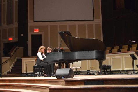 A beautiful duet... Mrs. Ham and John Thomas Freeman perform a song together at the recital. Photo by Jillian Surla.