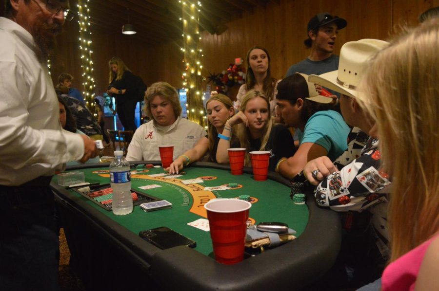 What a game... Fairhope seniors play a round of Poker. Photo by Jillian Surla.