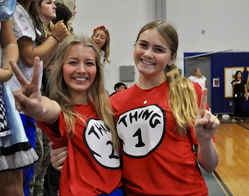Twin up… Seniors Stella Sheldon and Red Ribbon Leader Josie Linn say “Boo!” to drugs in their Halloween costumes. They brought school spirit to Red Ribbon Week.