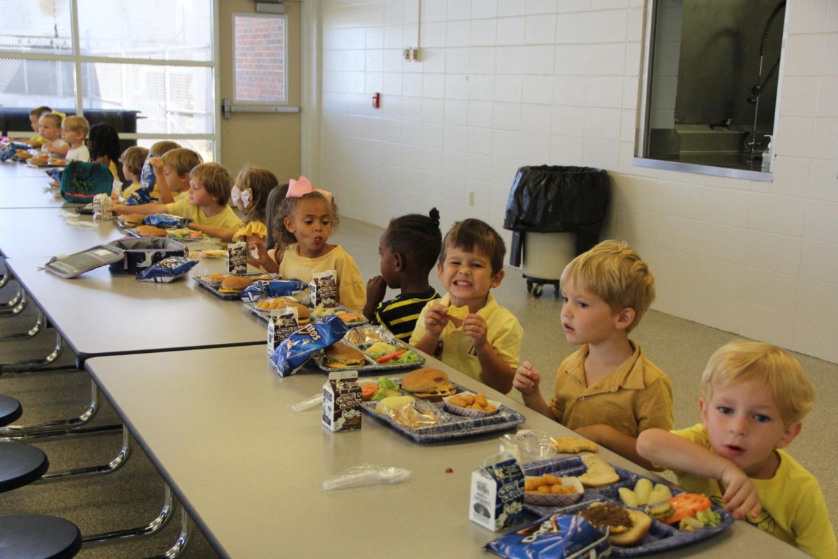 Golden grub... FHS pre-k students eat their lunches while wearing their gold.