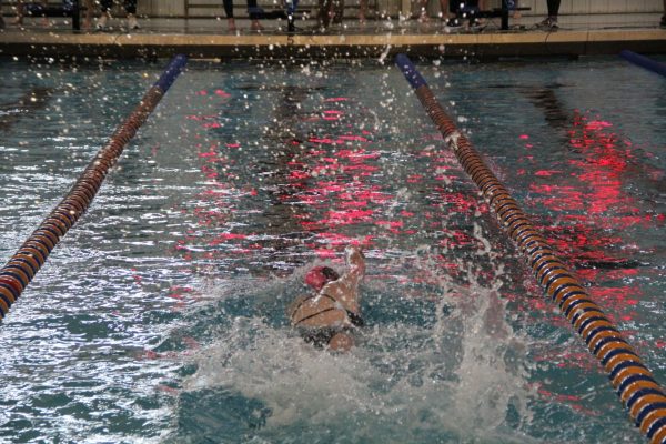 Second Lap… Amare swims her second freestyle event. She placed first, and prepared to fill in for her teammate on the 200 relay.