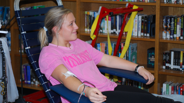 Expressing love… Kylie Hester gives blood to show care for people in need. She participated to show love for the school. 