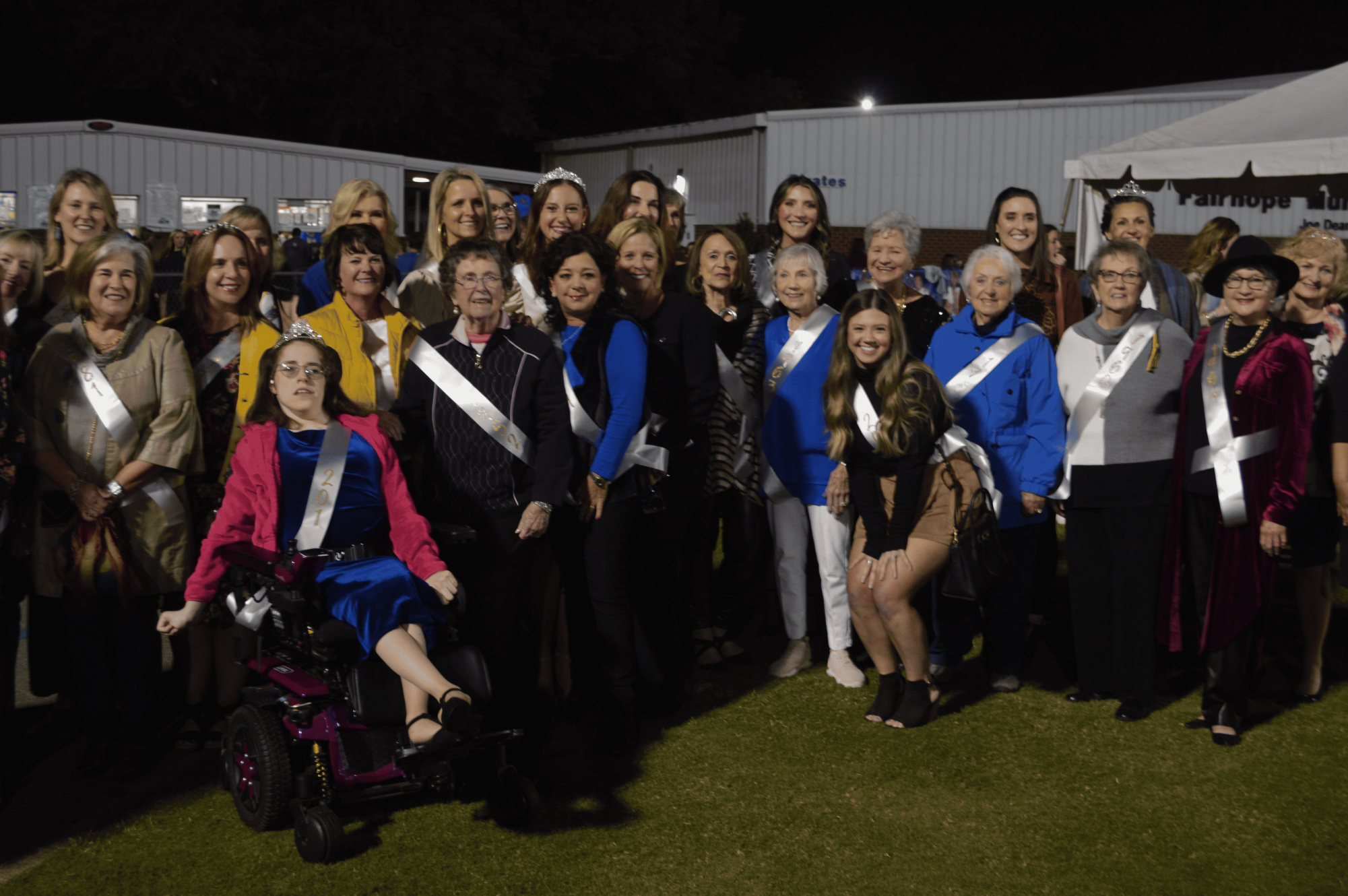 The royal court… Twenty-nine homecoming queens of all ages gather after their introductions. The ladies said their goodbyes and made their way home.