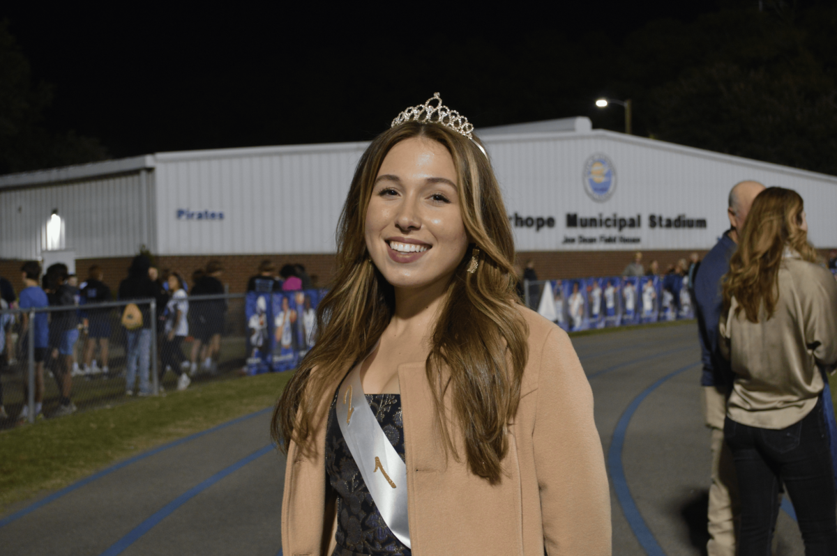 A recent queen returns…. Gambino, queen of 2019, looks upon the changes the student body and football field have gone through since her time at the school.