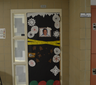 Principle Decorations… Principal Jon Cardwell’s photo adorns  Katherine Stewart’s door. Other teachers also feature Cardwell’s face.
