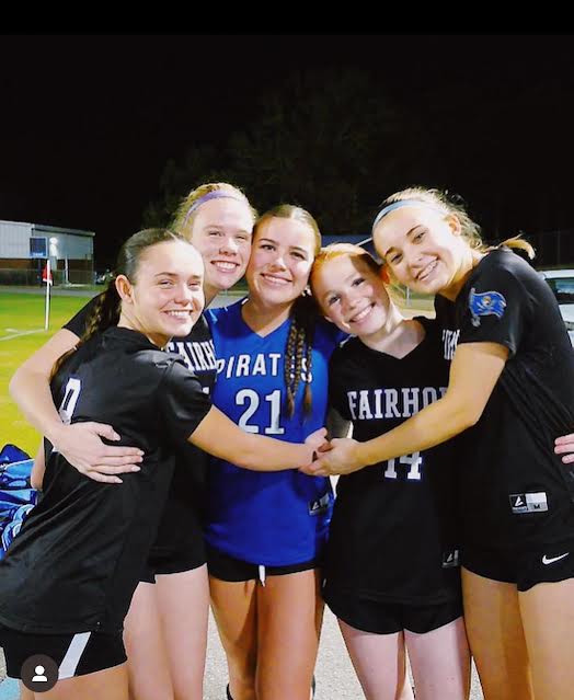 Still smiling… Even after a loss Ann Haven Sherrell, Ann Clark Smurda, Peyton Davis, Sadie Sparks and Mary Marshall Roberts support their teammates. The Lady Pirates congratulated Oak Mountain and ended their night with a team huddle. 