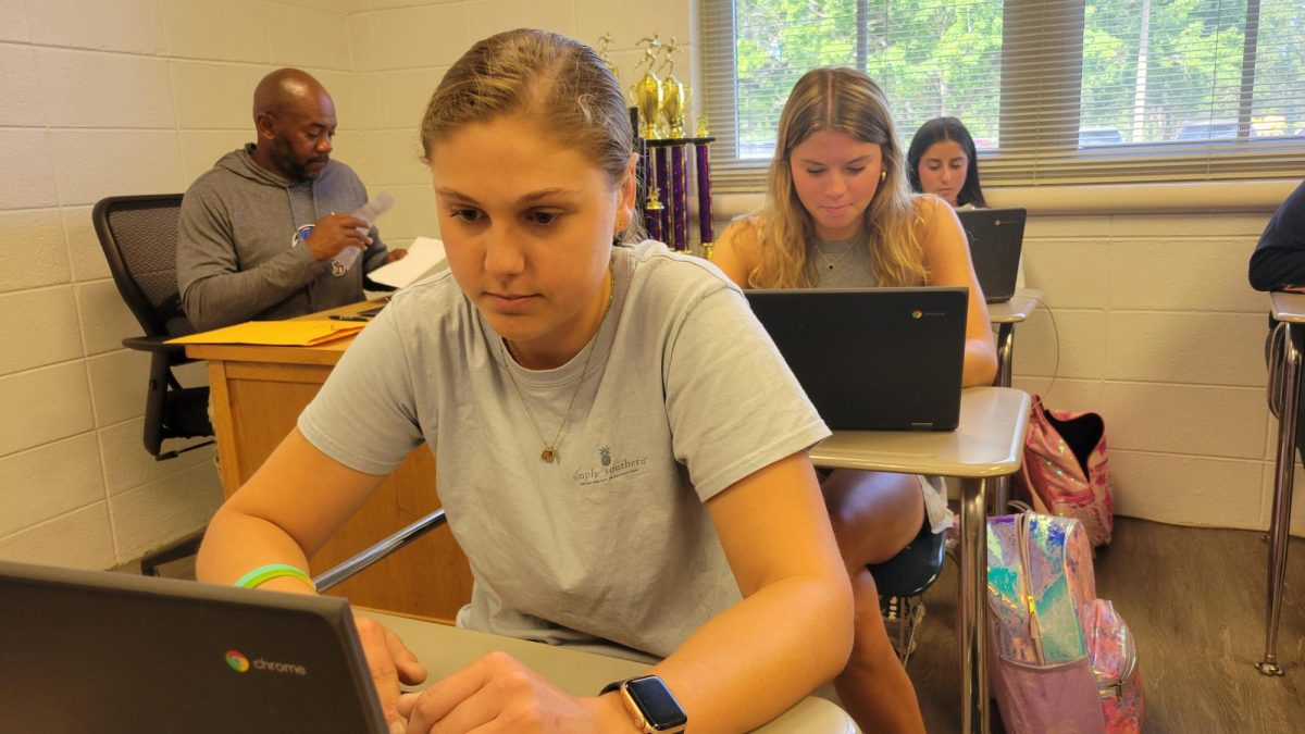 Working ahead… Fairhope High School junior Jenna Kowal revises an essay for her dual enrollment course. She used her time diligently working on her assignment and submitted it before the due date.
