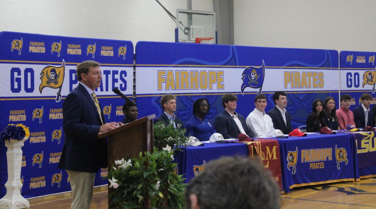 Opening up… Thursday, April 25, Fairhope High School held a signing day. Students who are taking their sport to the next level are signed a letter of intent to their college of choice. This marked a huge point for not only the individual athlete, but for the school. Assistant Principal Josh Howell started signing day with a speech praising the hard work and dedication of the athletes. He emphasized the integrity of these driven individuals.