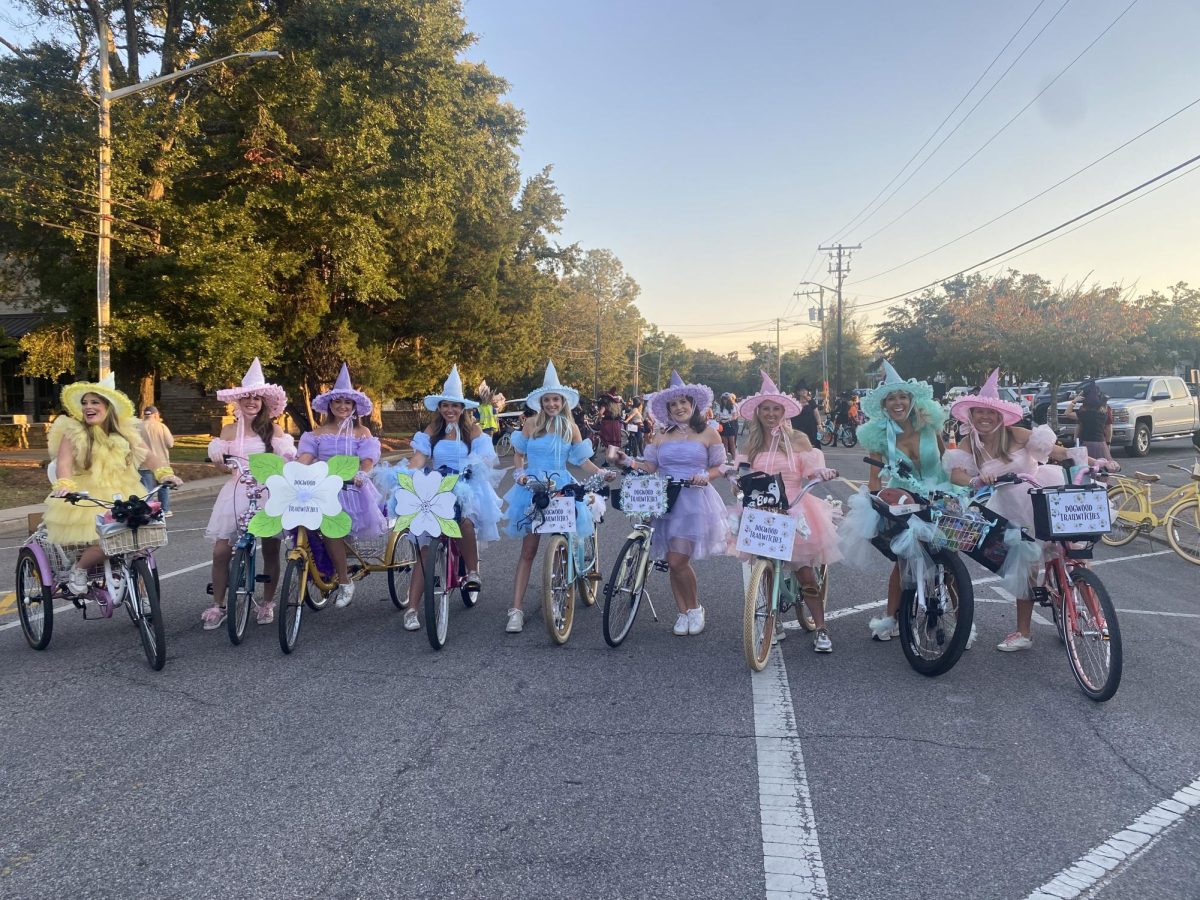 Ready set pose… The Dogwood girls prepare to participate in Fairhope's annual witch's ride. The women dressed as witches with a little twist.