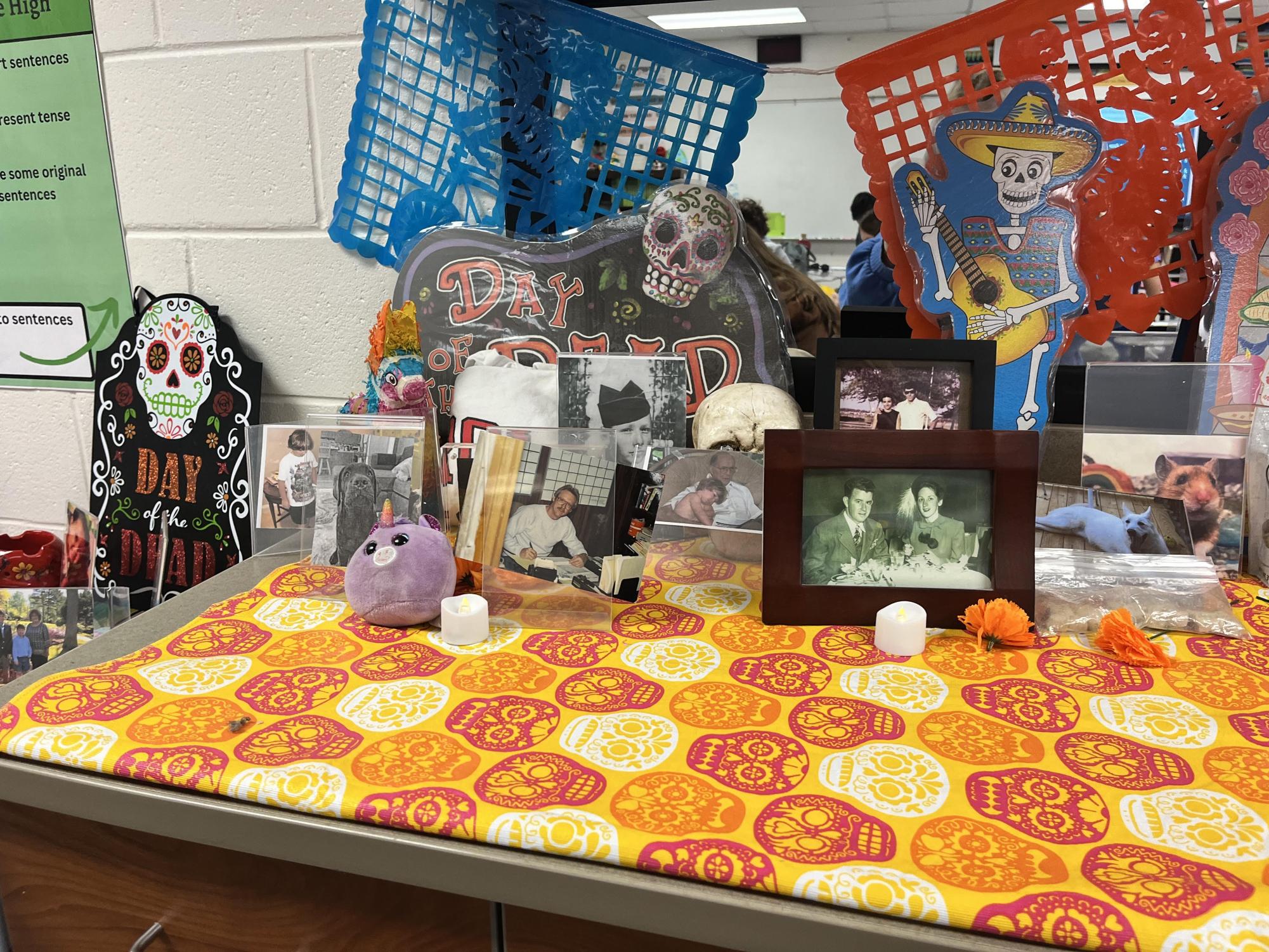 Ofrenda of honor… Senora Holt’s Spanish two classes create class Ofrenda to celebrate the loss of loved ones. They decorated with pictures and objects that signified each student's family, friends and pets for the Day of the Dead holiday.