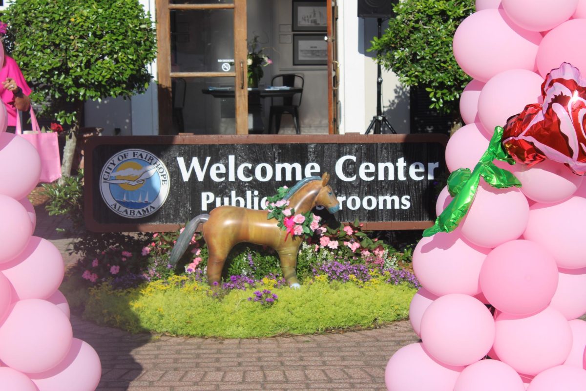 The City of Fairhope Welcome Center, decorated and ready for women to come by and get some goodies, hosted Girls Night Out. The turn out exceeded expectations with many women showing up and having a great time. “There were so many women having such a great time, and bringing many women together,” Delamore said. Photo by Abbie Butler