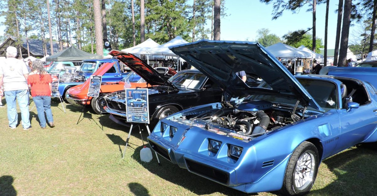 Revving Up… A car show took place behind the Fairhope Public Library as an added attraction to the weekly Fairhope fresh market. The market and car show opened to the general public.