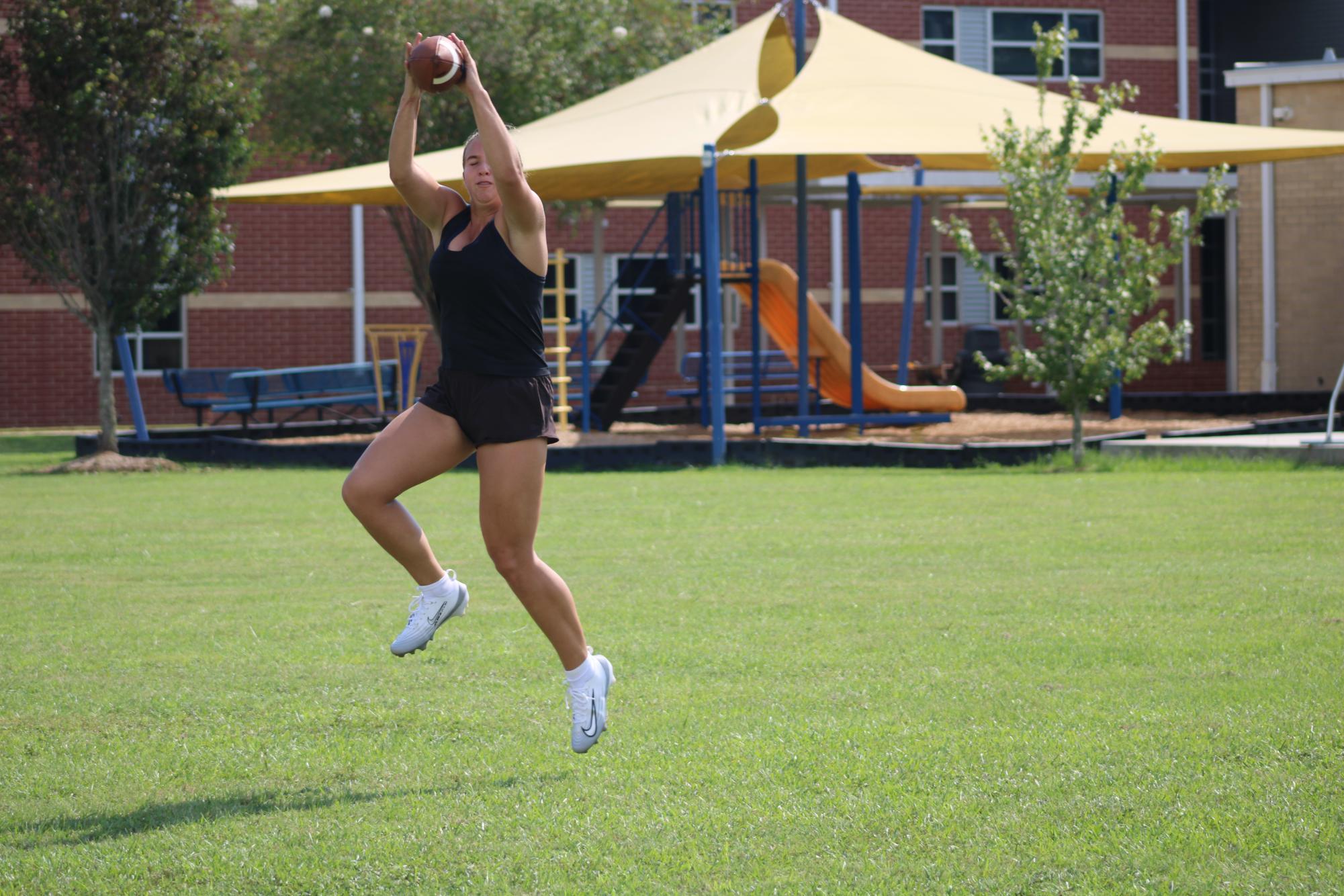 Practicing plays… Jordan receives the pass while practicing plays to defeat the Toros this Tuesday, August 26. The team rotated between conditioning and drills. 

