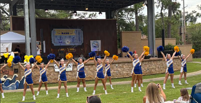 Strike that pose... Fairhope Middle School cheerleaders kick off the Back to School bash with classic Pirate cheers. The crowd sang with cheerleaders and repeated the Pirate calls.