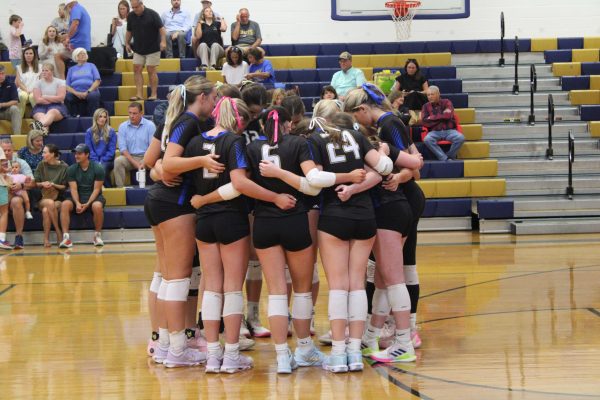 PIRATES ON 3… The Fairhope Lady Pirates huddle and share words of encouragement to each other. 