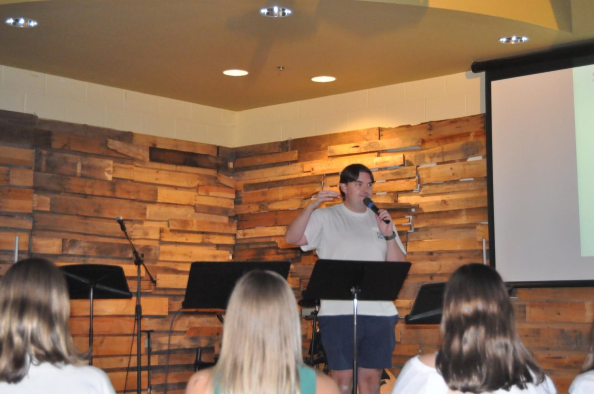 Time for sermon... Youth group leader Miles Barnheart delivers a sermon on mental health. Barnheart spoke about his mental health experience and how teenagers can positively influence mental health.