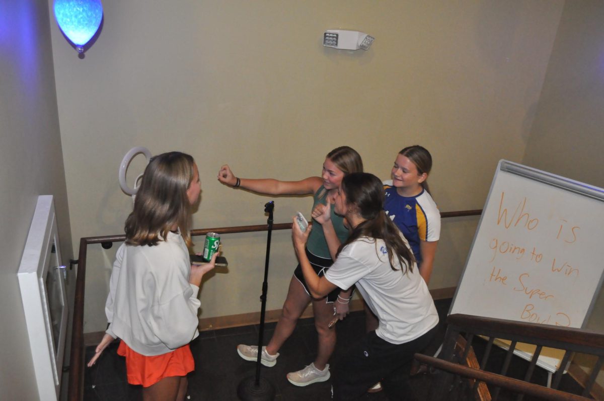 What's the question... Freshmen Alice Webb, Huffman, Horn and eighth grader Molly Kate Bishop answer the nightly question on their way out of the church. Barnheart posted answers to the church’s Instagram account the next day.