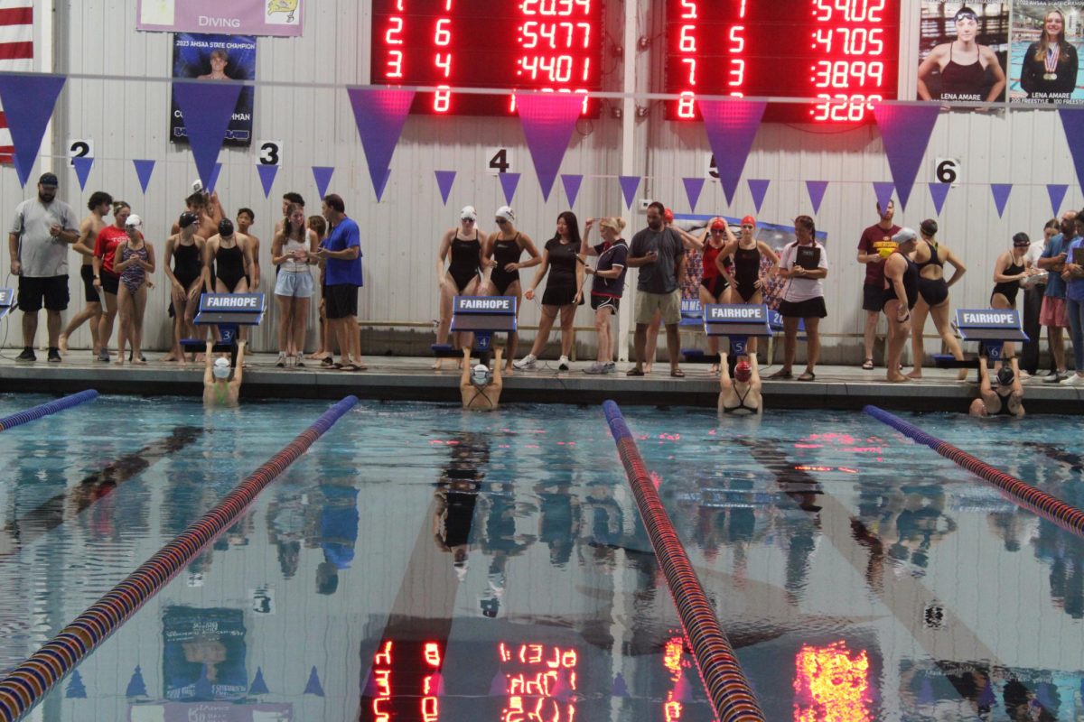 Kick off… The 200 medley relay team prepares for the start. Fairhope placed 1st in the first event of the season. 