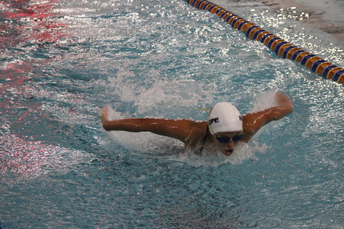 Feeling the pressure… Lydia Brown swims butterfly in the 100 yard butterfly race. Brown also swam anchor in the 200 yard medley relay. “It's a lot of pressure being the last one because you have to finish strong but when I see all the other girls in my team finish strong, it inspires me to do the same,” Brown said. 