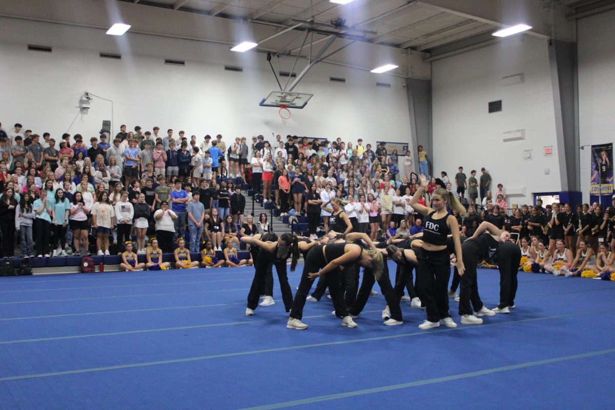 Hold up, pose… FDC strikes final pose at pep rally. They danced to a hip-hop style dance. (Audrey Parsons)