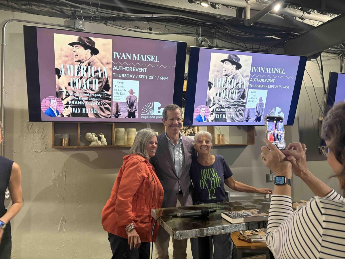 Say cheese… Participants line up at the end of the event to take pictures and get their copy of American Coach signed. Maisel met with many participants and answered all their questions as well.