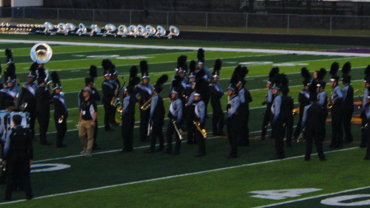 Bracing for greatness…The Elberta High School Band of Warriors prepare for their approaching opening act entitled “What a Wonderful World.” This marked the beginning of the 2025 Band Jamboree at 6:30 p.m. on Sept. 29. (Sydney Melanson)