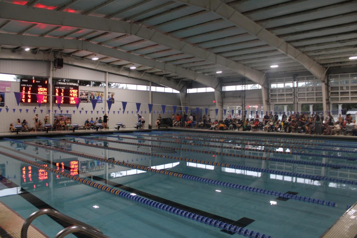 Reflected on the water… Swimmers competed fiercely in a multi-school meet at the Fairhope Recreation Center and Municipal Pool Thursday, September 25, capping off a demanding day of competition and training. (Liam Silva)
