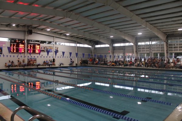 Reflected on the water… Swimmers competed fiercely in a multi-school meet at the Fairhope Recreation Center and Municipal Pool Thursday, September 25, capping off a demanding day of competition and training. (Liam Silva)
