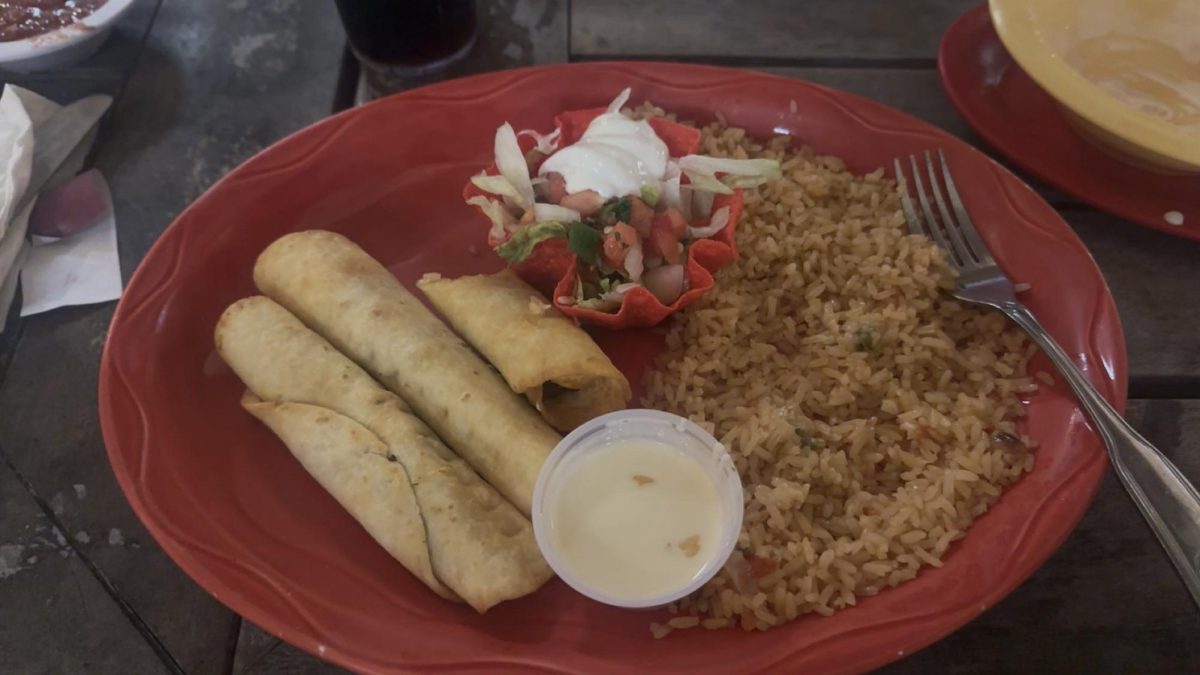  Fried up goodness…The smell of fried tortillas and cheese dip made every mouth at the table water. The dish came with three flour tortillas and a choice of either beef, shredded chicken, or carnitas inside them. (Audrey Parsons). 
