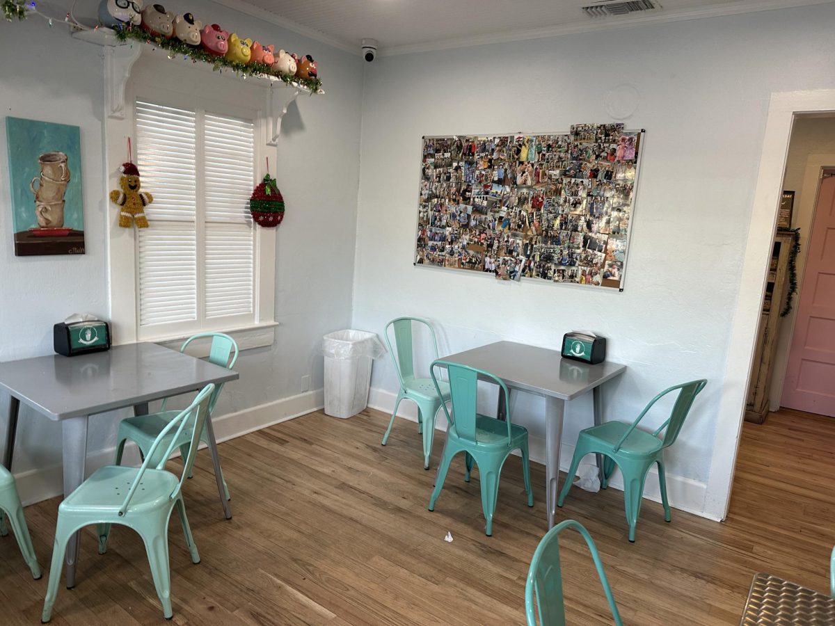 Comforting interior…..Simple decor with the photo wall of customers gives Mr. Gene’s Beans a welcoming feel. 