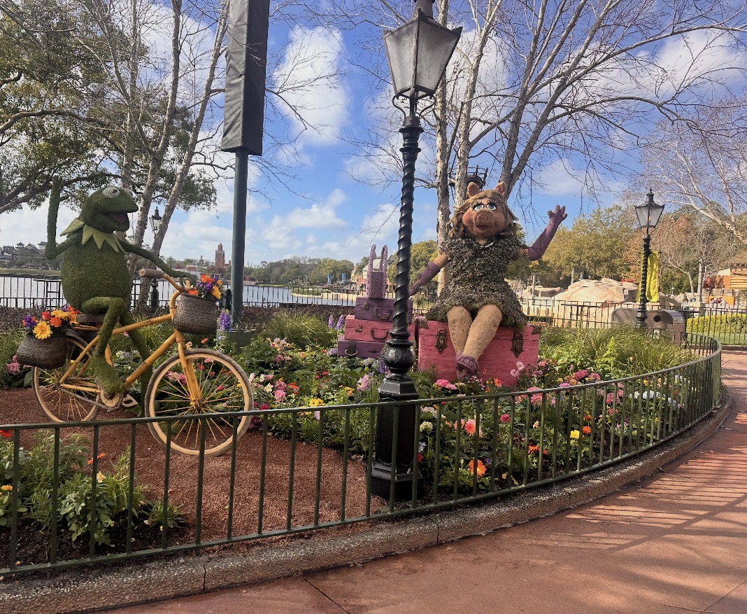 Hi, oh there…Kermit the Frog and Miss Piggy wave at passers walking into Epcot’s World Showcase. Each pavilion around the world featured a Disney character whose movie relates to or is set in that country.
