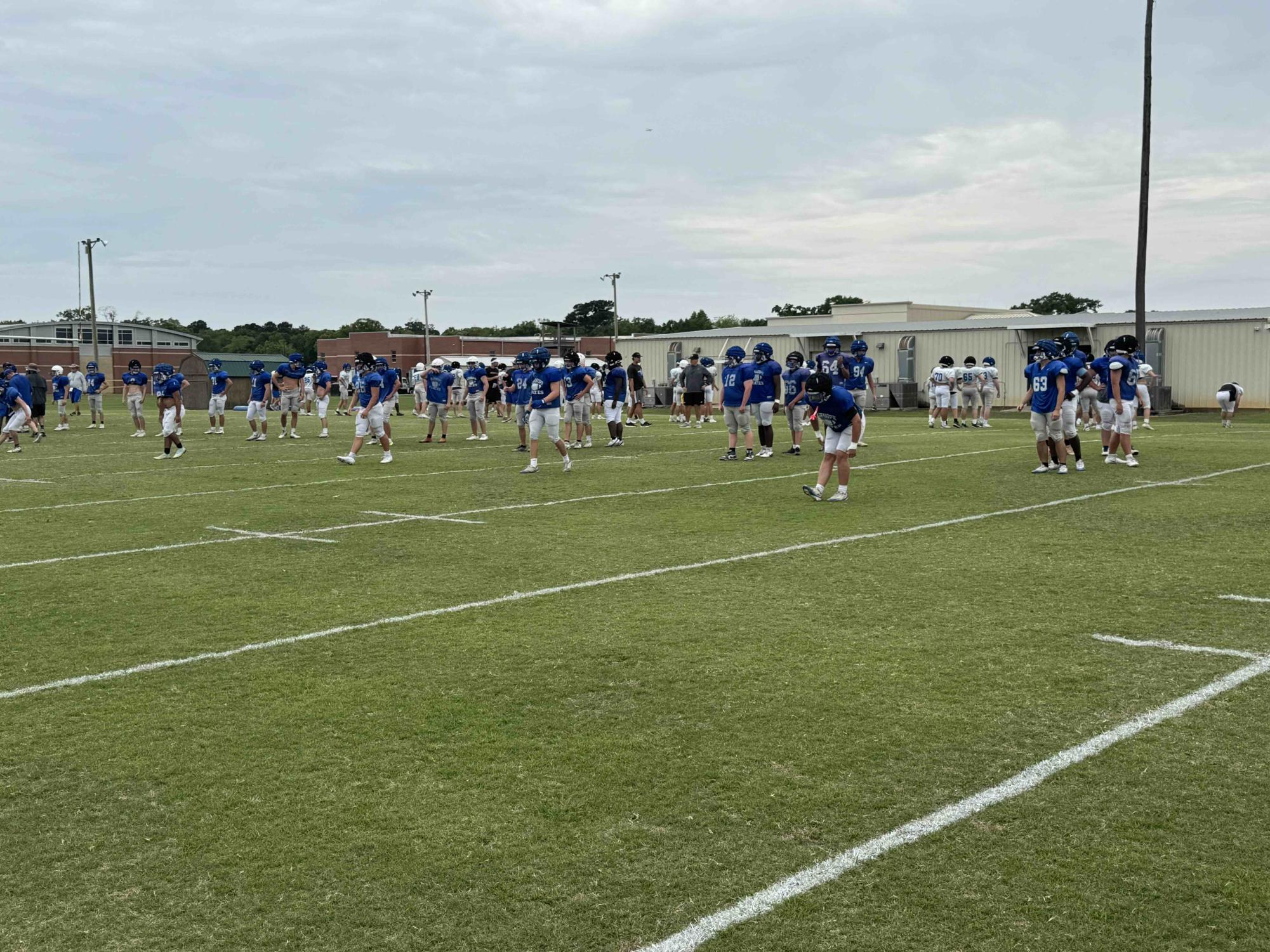 Warming up...Fairhope football team starts practice with stretches everyday. ”Im so thrilled for the season to star, This is my first year playing high school football and I can't be more excited. I'm so grateful to be on this team and to have the leaderships that we have on the offensive line,” said Noah Spitizer, freshman. (Bryce Wells)